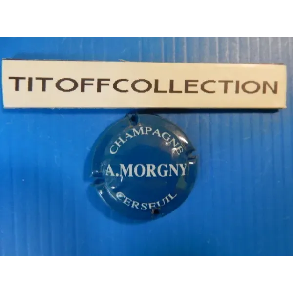 1 capsule de champagne morgny a  bleu et blanc